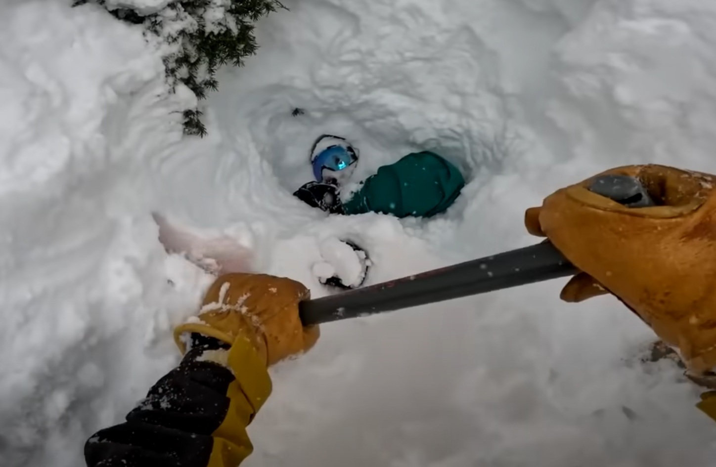 Snowboarder's Brush With Death Ends In A Dramatic Rescue By A Brave Stranger
