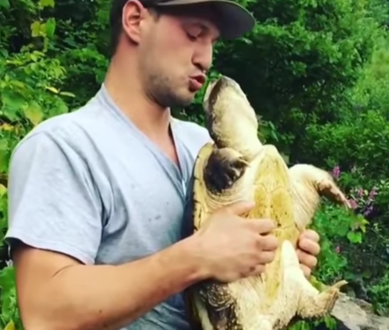 Guy Tries To Kiss Snapping Turtle