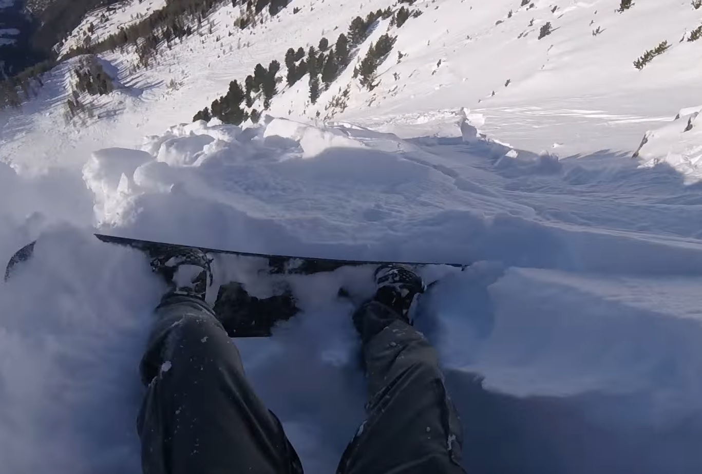 Snowboarder Gets Caught In Avalanche